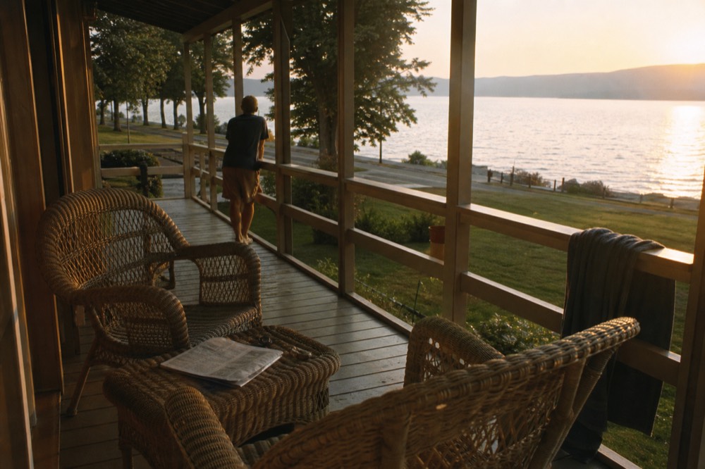 Lakeside lodging with a porch overlooking the southern end of Seneca Lake, no text, no logos, no people